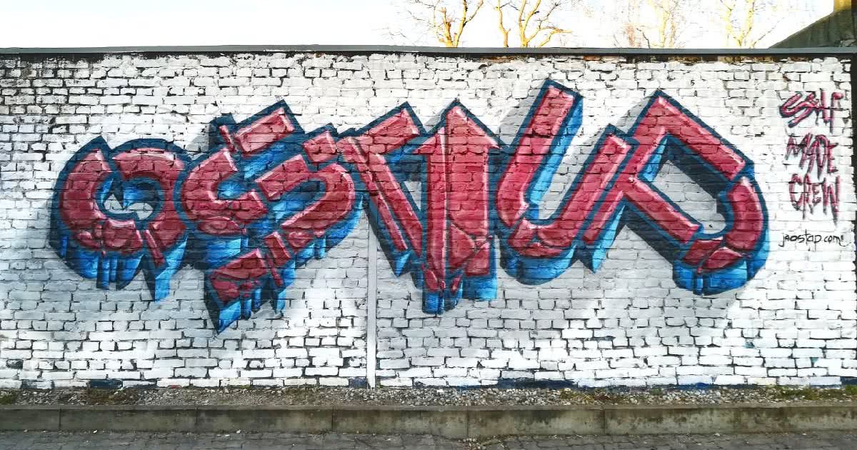 “OstUp” graffiti lettering on a wall
