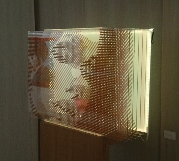 3d packing tape portrait-Ostap tape artist 2015- yellow light- Side view 3d packing tape installation- Female Portrait- Closeup