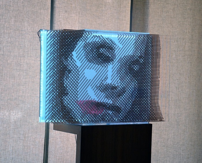 Side view- Faqlove reloaded - 3d packing tape art- woman portrait Side view- Faqlove reloaded - 3d packing tape optical art- Ostap 2015