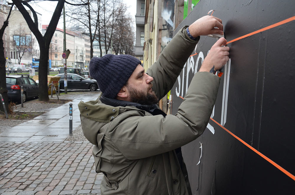 Tape artist Slava Ostap create duct tape graffiti in Berlin for Stromae