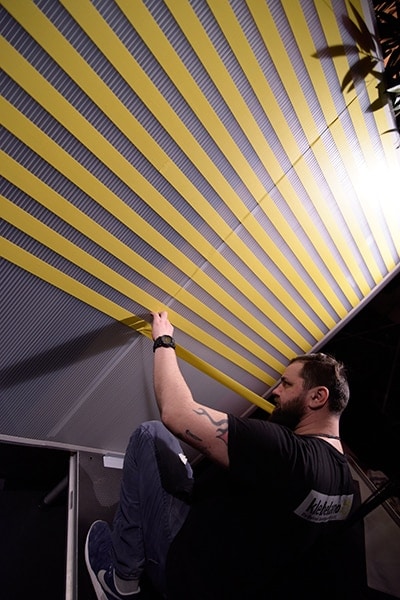 Tape artist Slava Ostap at work in Stuttgart