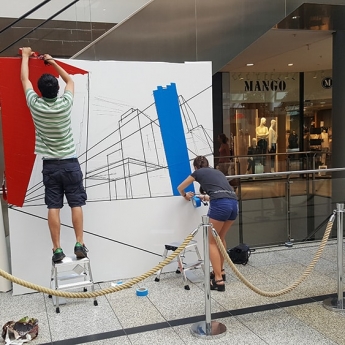 Selfmadecrew at work- creating of tape art skyline