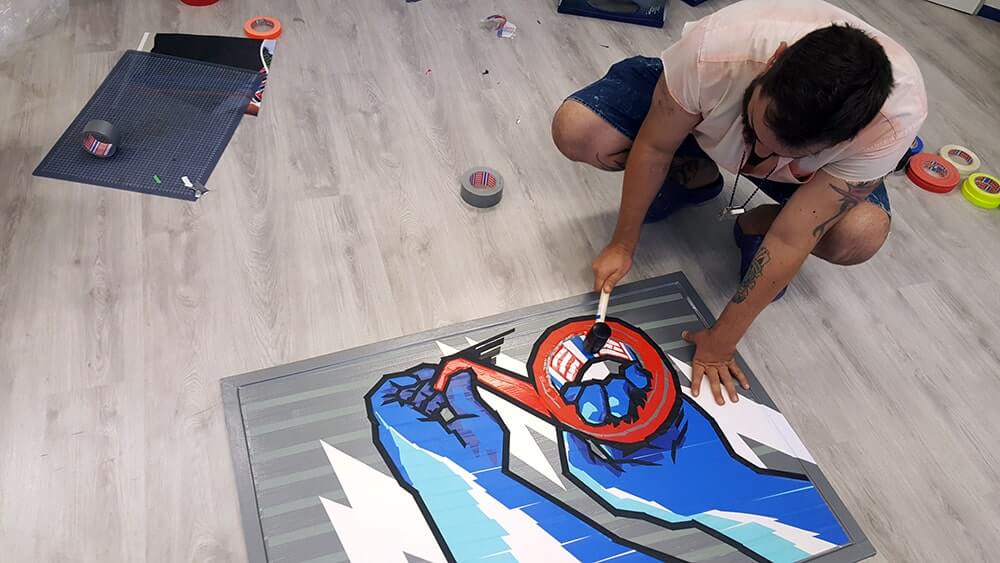 Tape artist at work- Tape art for brand- commission for Tesa Image 4-Ostap at work- commissioned art for Tesa by Ostap