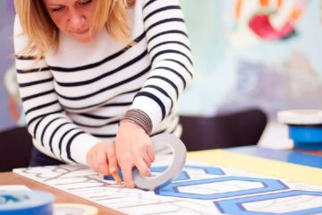Concentrated on gluing- Tape Art Workshop by Ostap