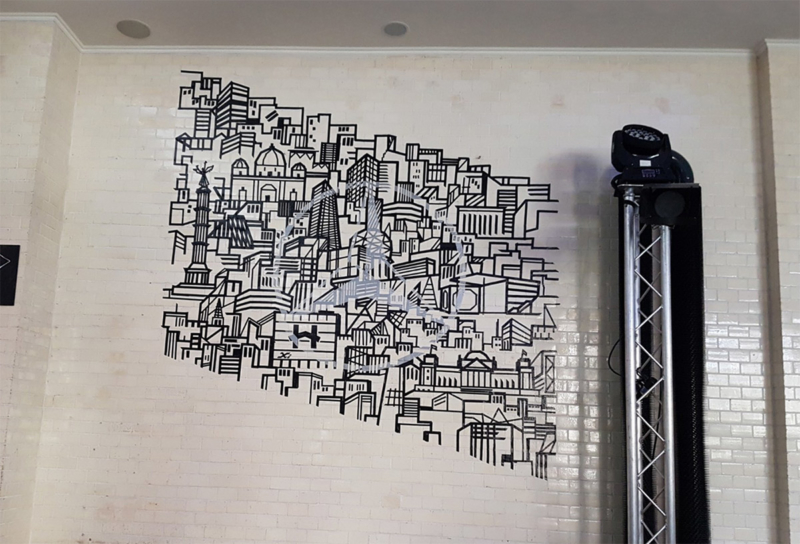 Mercedes star logo as skyline-adhesive tape graffiti wall art