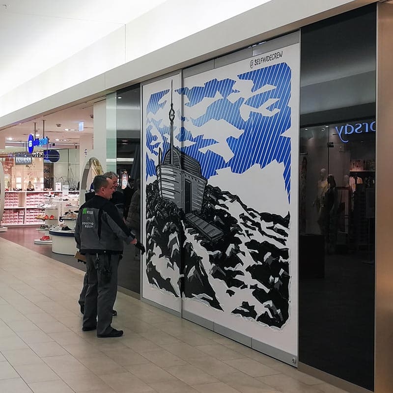 Finished duct tape artwork and the visitors of the arcades
