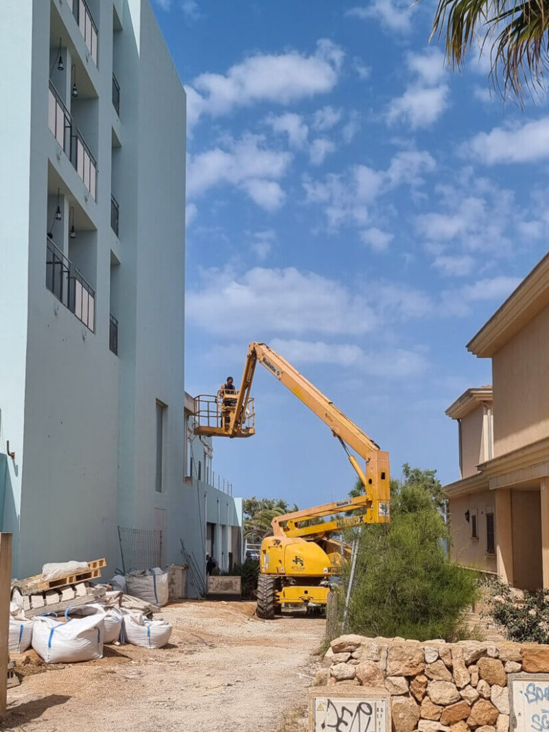 Mural art on hotels facade in progress