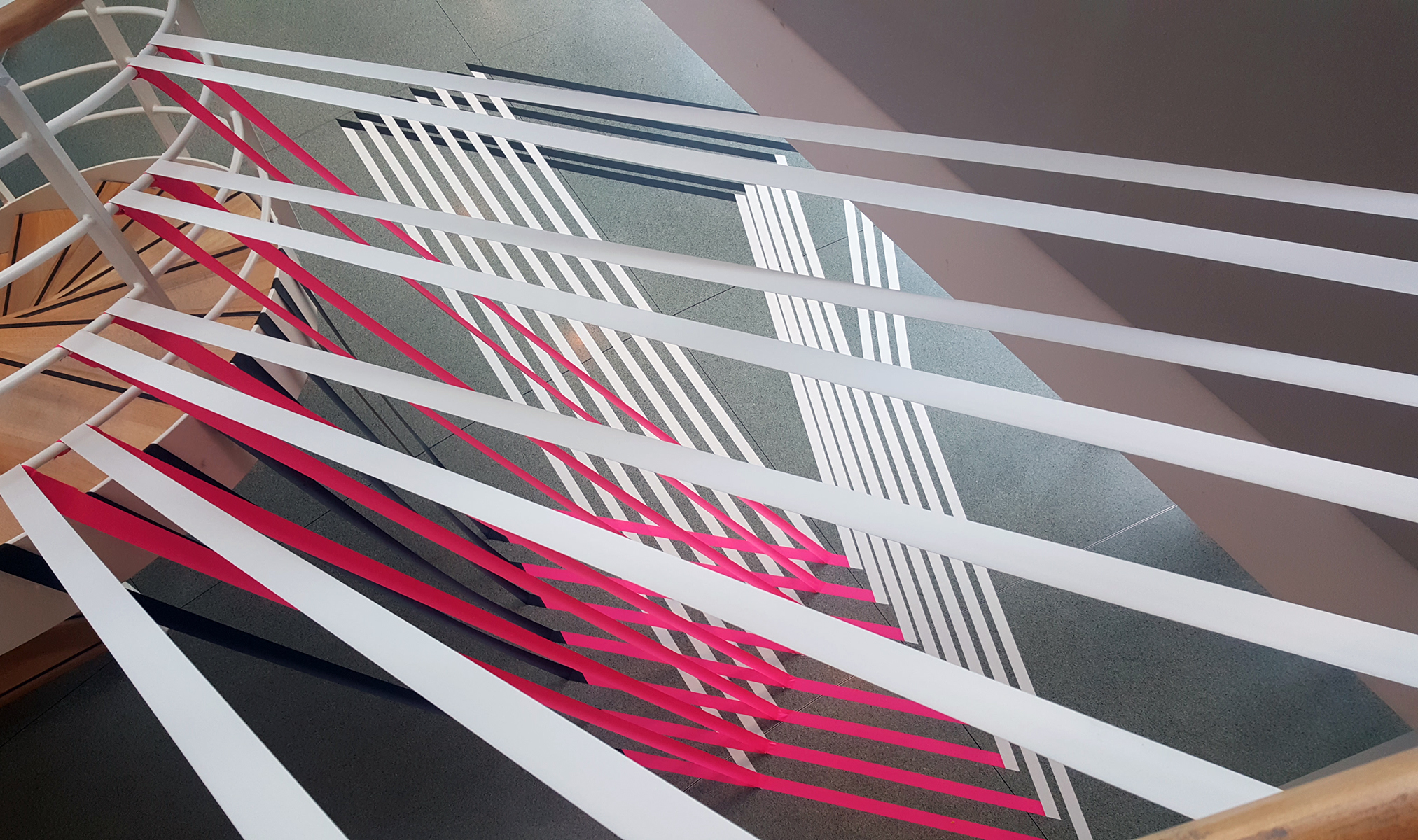 Geometric tape art room installation in Hamburg